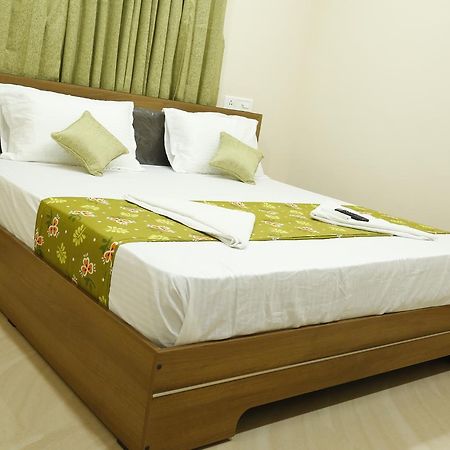 Hotel New Amirtham Inn Palni Buitenkant foto
