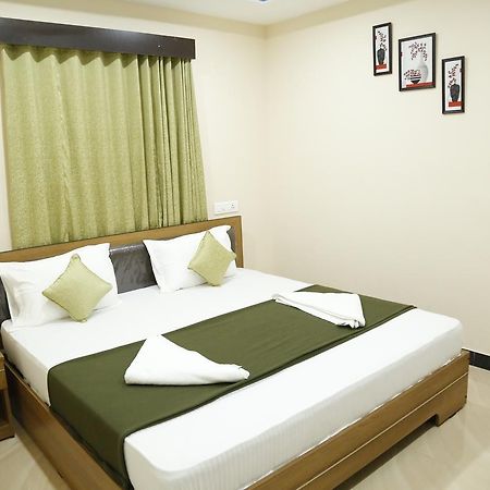 Hotel New Amirtham Inn Palni Buitenkant foto