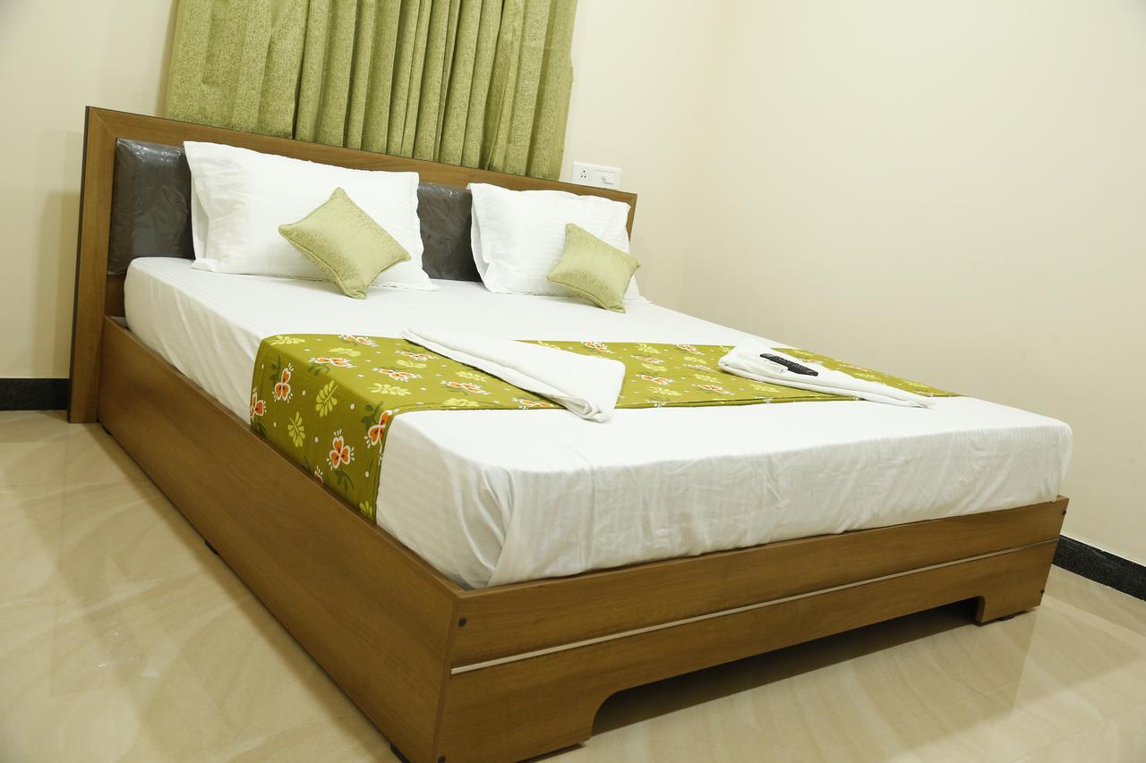 Hotel New Amirtham Inn Palni Buitenkant foto