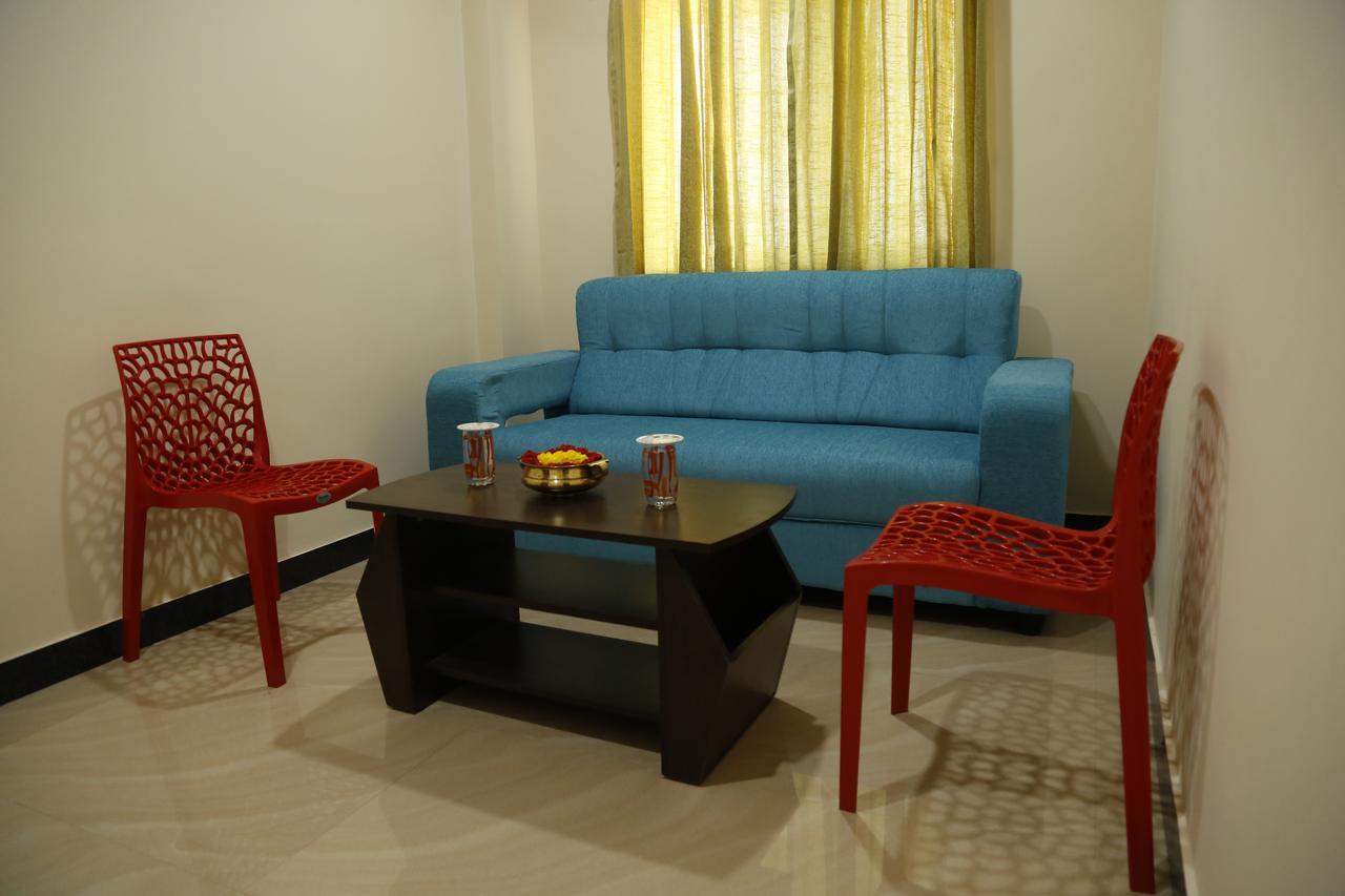 Hotel New Amirtham Inn Palni Buitenkant foto