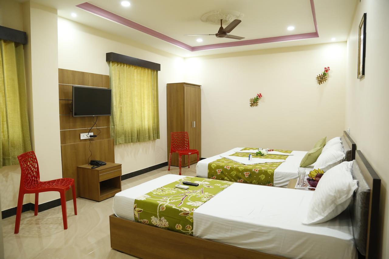 Hotel New Amirtham Inn Palni Buitenkant foto
