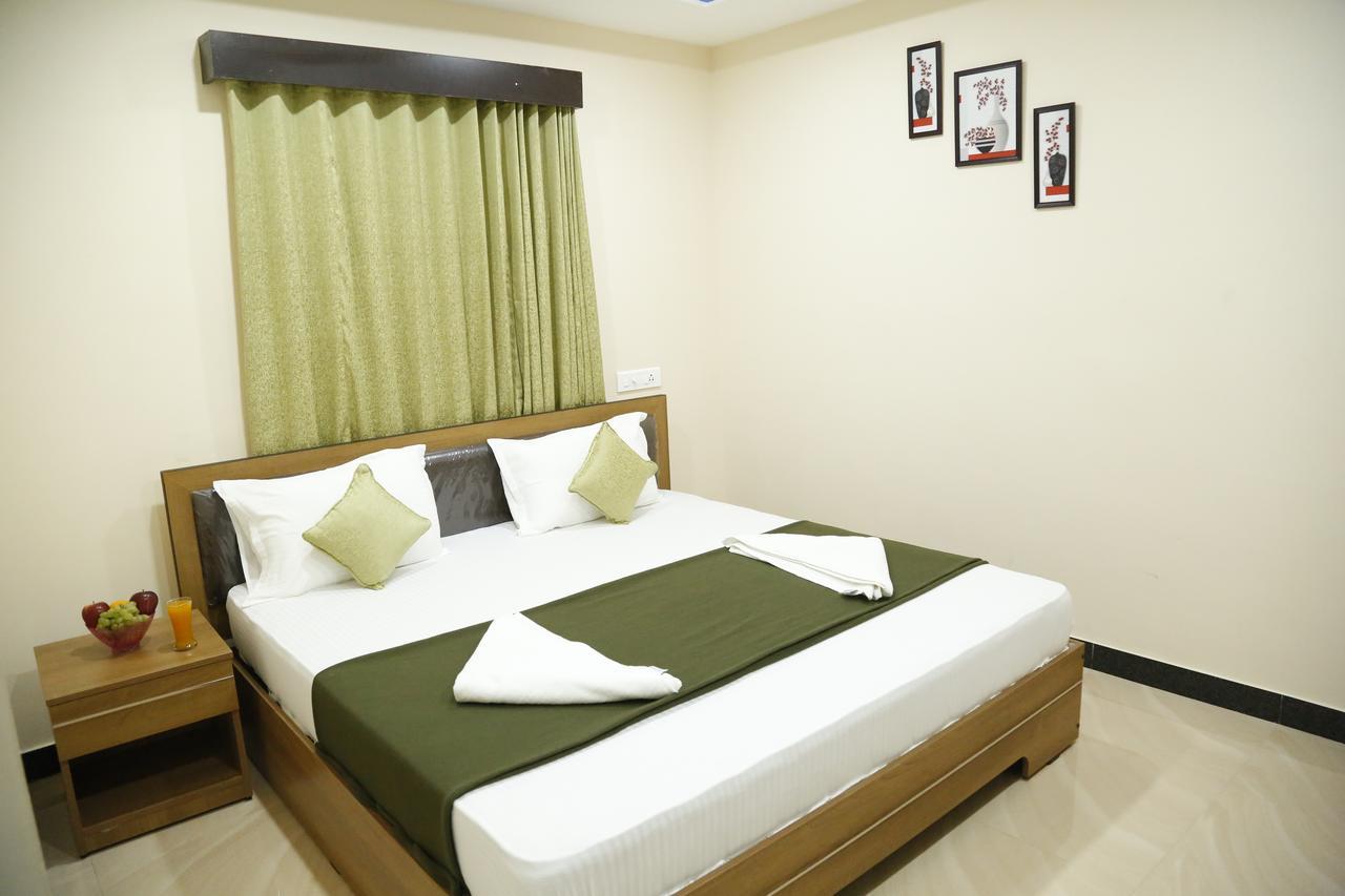 Hotel New Amirtham Inn Palni Buitenkant foto