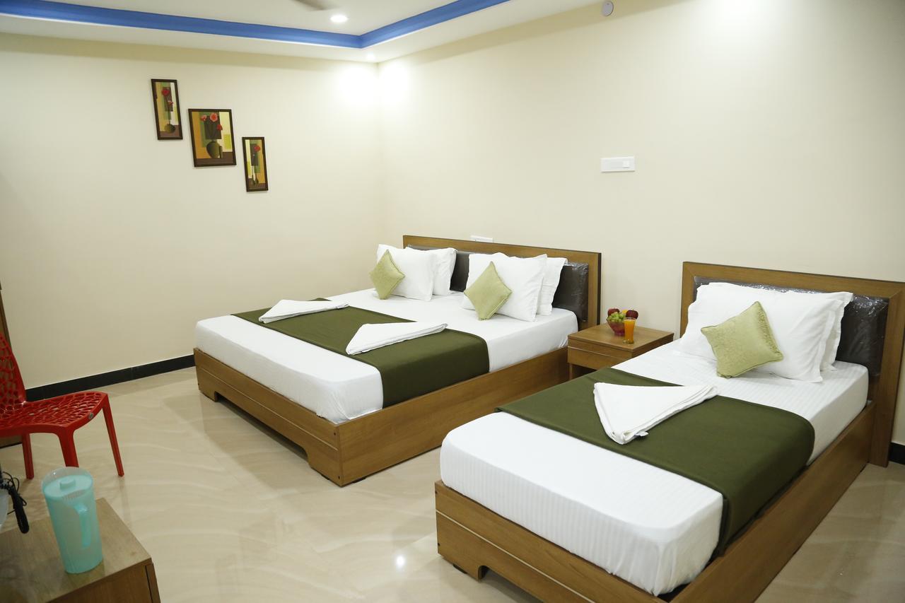 Hotel New Amirtham Inn Palni Buitenkant foto