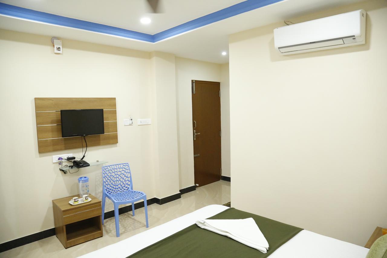 Hotel New Amirtham Inn Palni Buitenkant foto