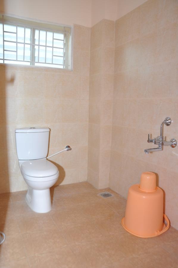 Hotel New Amirtham Inn Palni Buitenkant foto