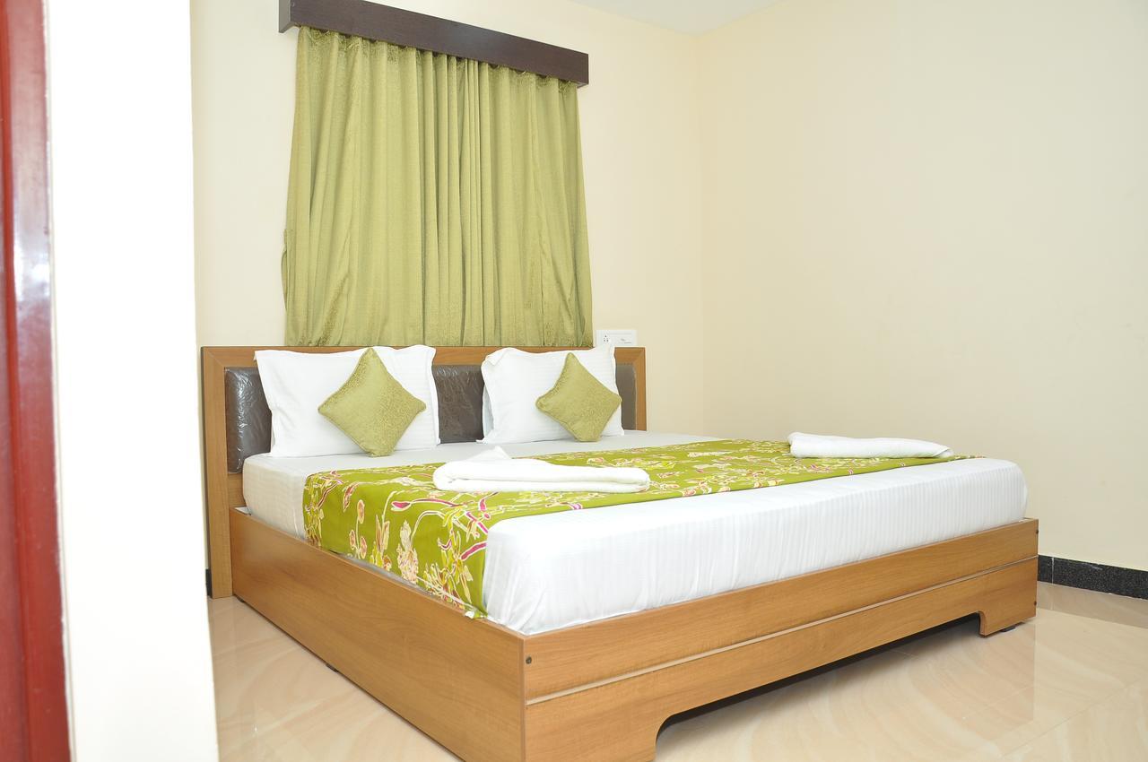 Hotel New Amirtham Inn Palni Buitenkant foto