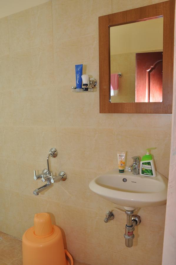 Hotel New Amirtham Inn Palni Buitenkant foto